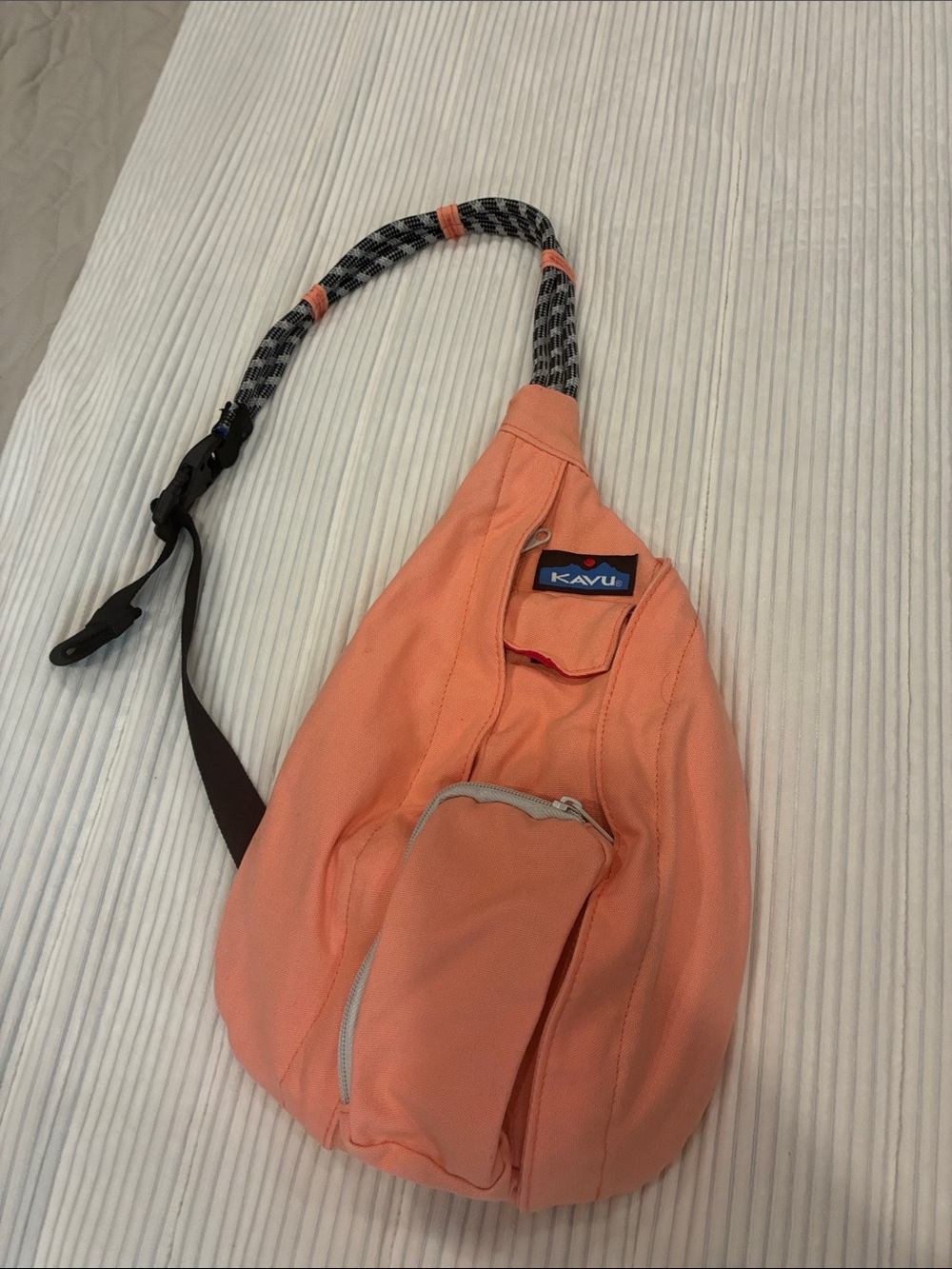 Kavu Peach Sling Bag with Black-Gray Rope Strap
